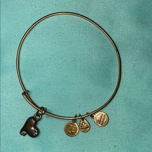 Alex and Ani heart with 2 diamonds. Normal wear.